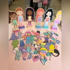 Story Magic Wooden Dress Up Dolls playset.
